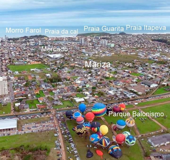 KITNET 01 em TORRES-RS - MELHOR CUSTO BENEFICIO na mais bela praia Gaúcha - cozinha - banheiro - ar condicionado - Smart TV 32' Android Apps Youtube - Netflix - Prime Vídeo e Wi-Fi - Estacionamento - Acomoda até 4 pessoas - Anfitriã Superhost no BnB Torres Exterior foto